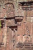 Banteay Srei temple - central sanctuary south doorway with sculpted devata